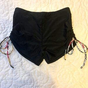Black swim shorts with ties